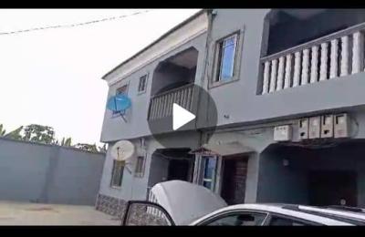 NICE AND WELL BUILT 4UNITS OF 2BED ROOM @ OJU ORE AROUND OJA BUS STOP IN A WELL SECURED ESTATE